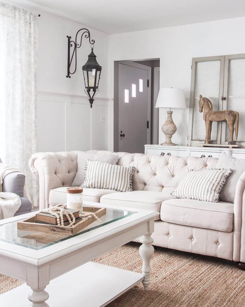 Beige Chesterfield Sofa with White Coffee Table