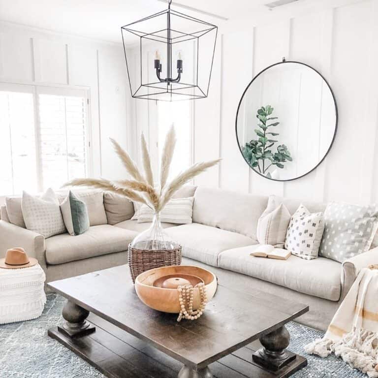 Beige Sofa with Black Framed Mirror