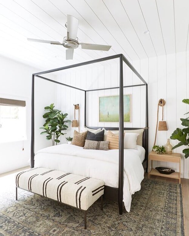 Black Cal King Canopy Bed in White Shiplap Bedroom