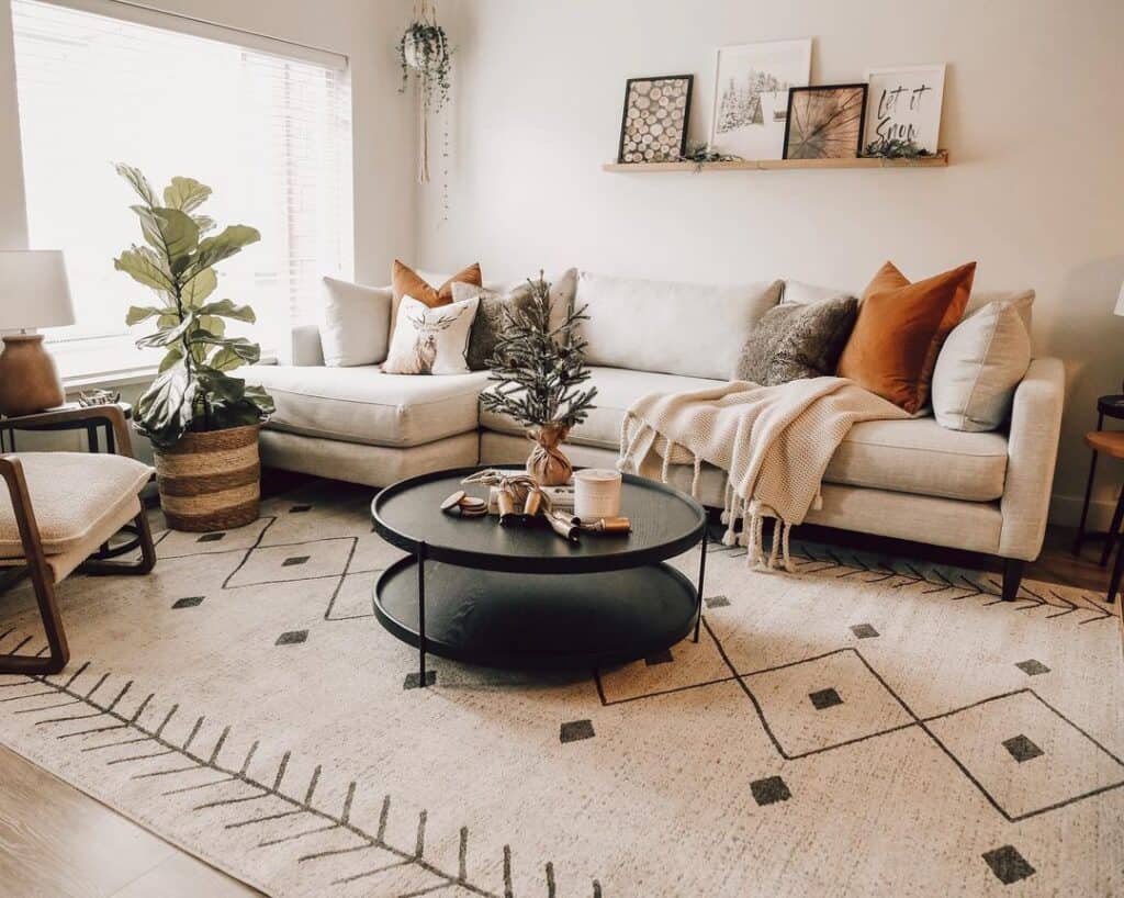 Black Two-tier Coffee Table with Beige Couch