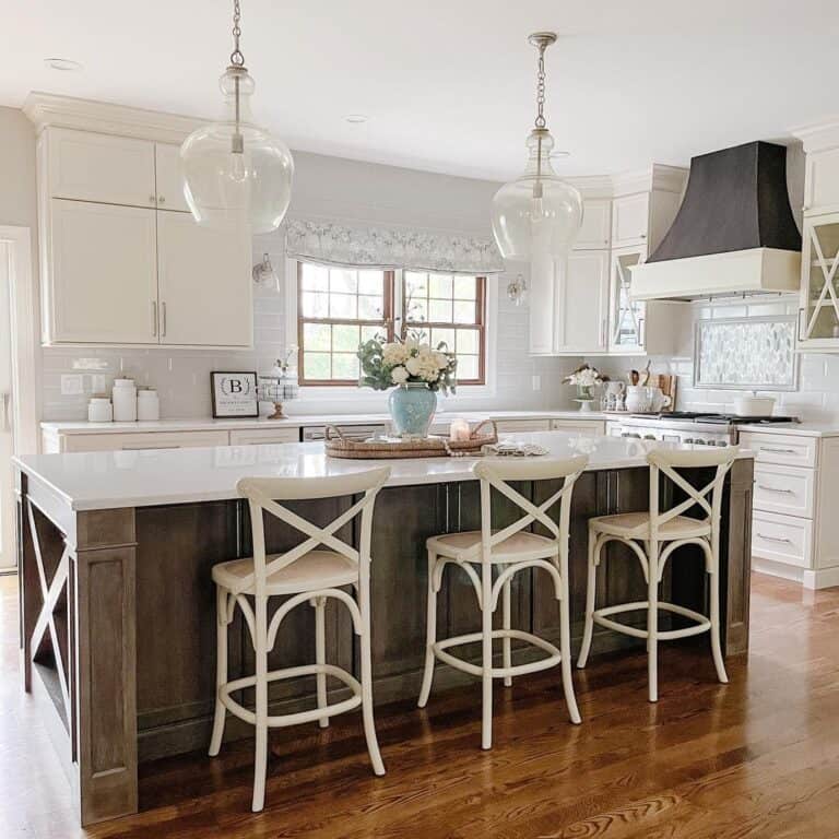 Cross Back Stools Beneath Glass Pendant Lighting