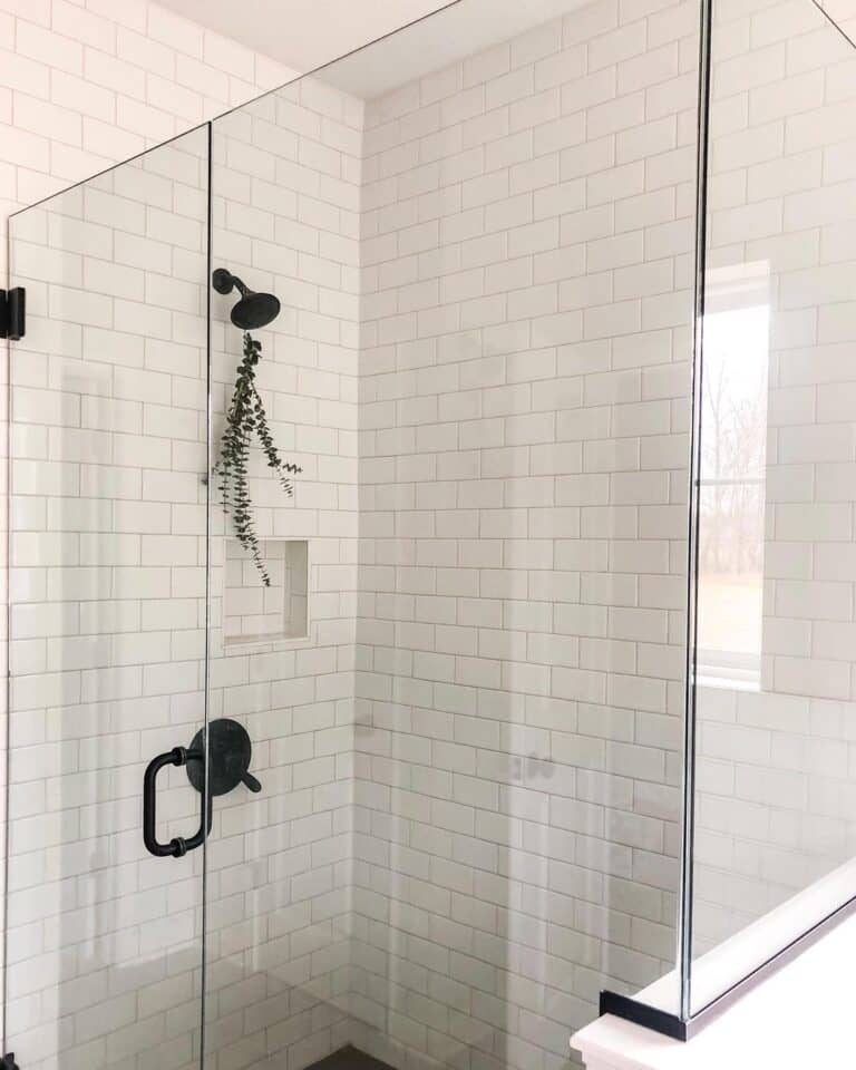 White Subway Tile in a Corner Shower