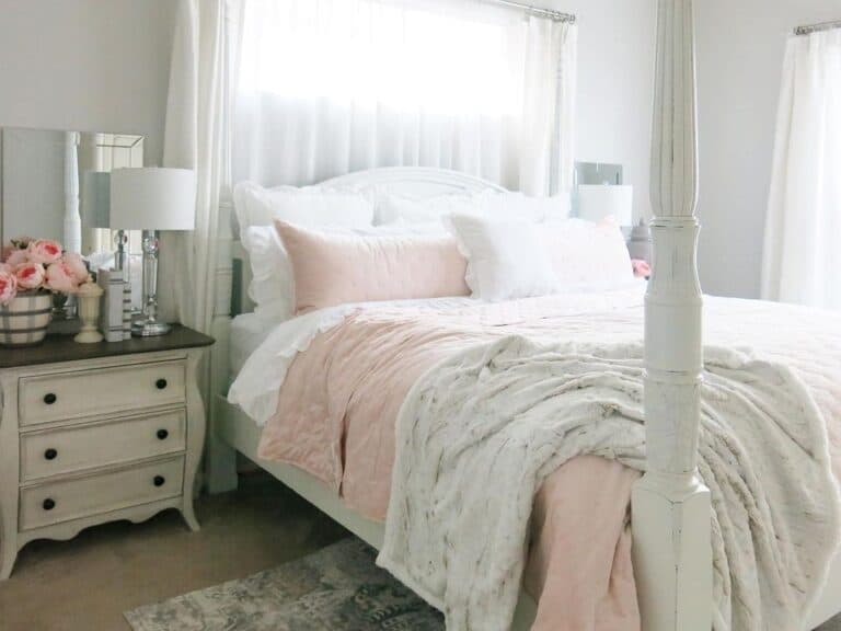 Four Poster Bed with White and Pink Bedding