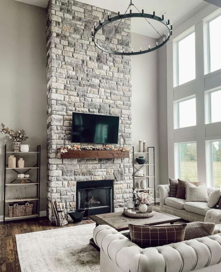 Gray Stone Two Story Fireplace with TV