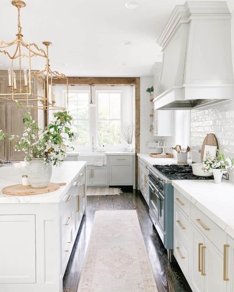 Kitchen with Gold Hardware on Light Gray Cabinets