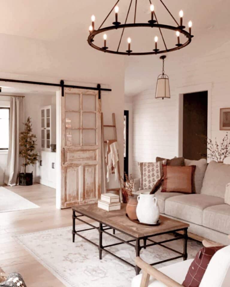 Living Room with Black Wagon Wheel Chandelier