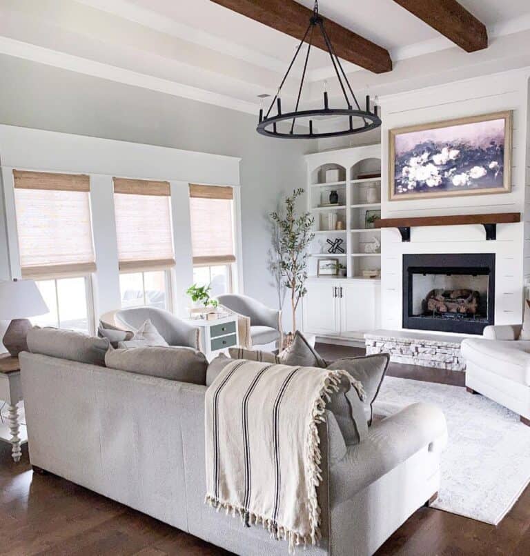 Living Room with Tan Roman Shade Windows