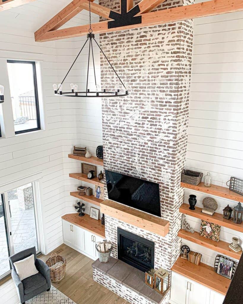 Living Room with Whitewashed Brick 2 Story Fireplace