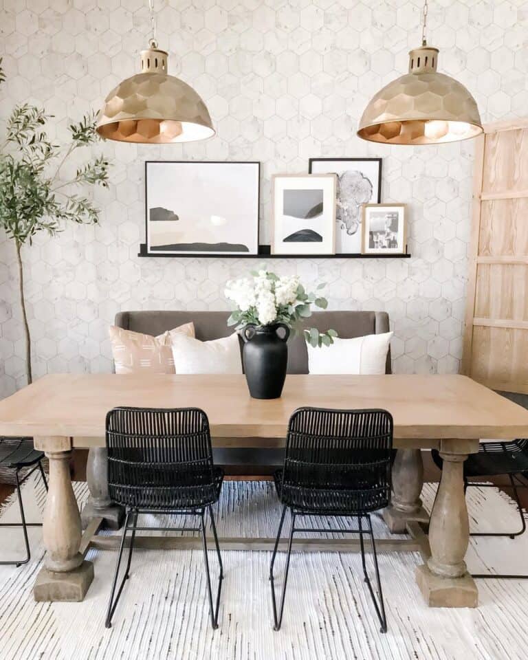 Black Dining Room Chairs and Brass Lighting