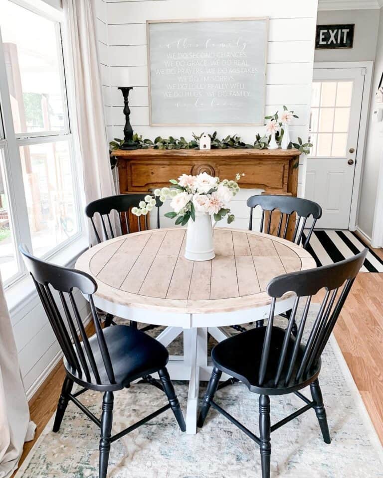 Round Dining Table with Black Spindle Chairs