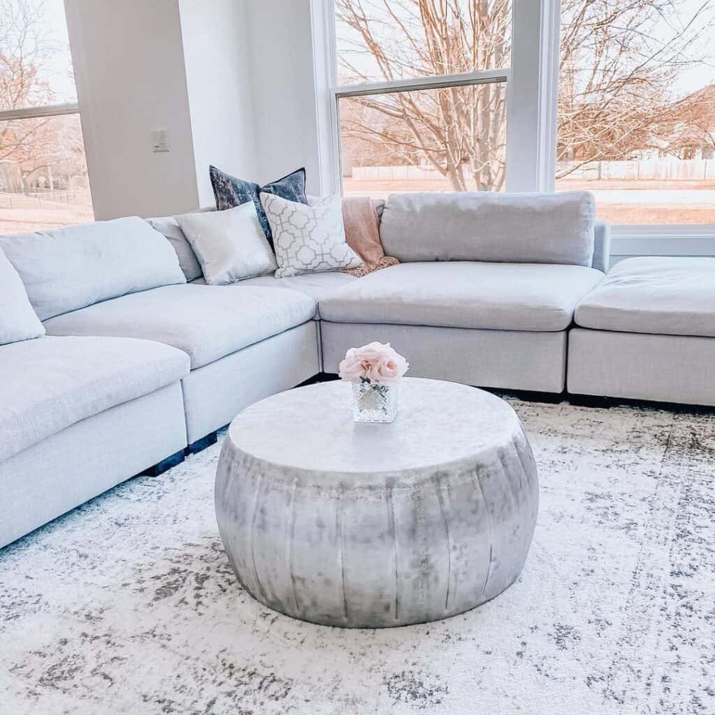 Sectional Couch with Gray Drum Coffee Table