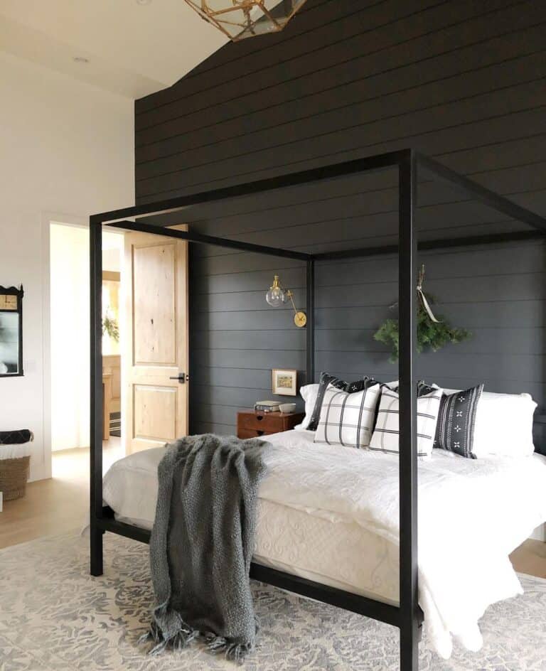 Shiplap Bedroom with Black Canopy Bed