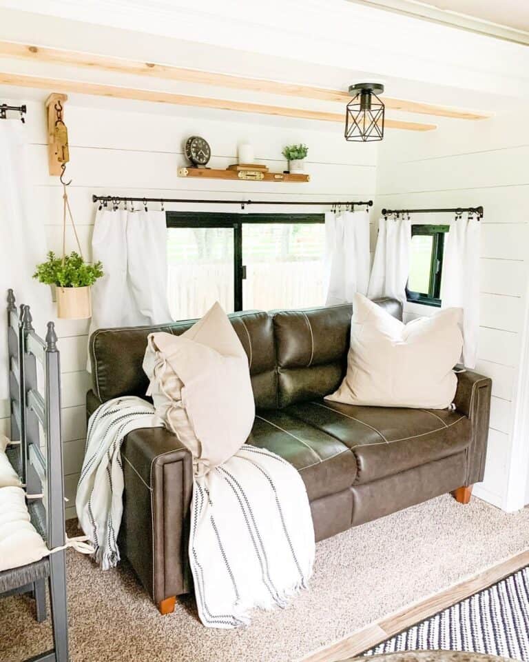 Shiplap Camper Living Room with Black Windows