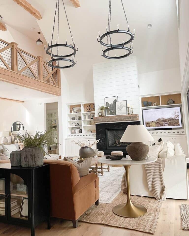 Two Story Living Room with Black Marble Fireplace