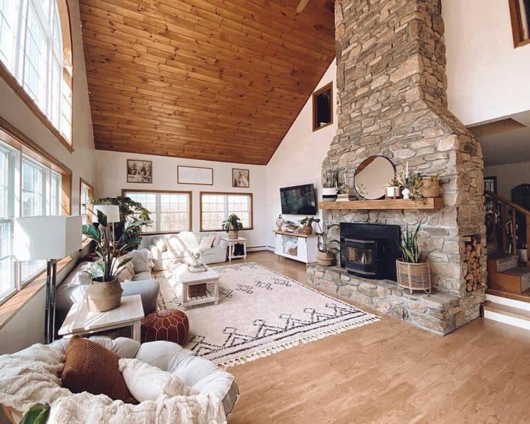 Two Story Stone Fireplace with Wood Mantel