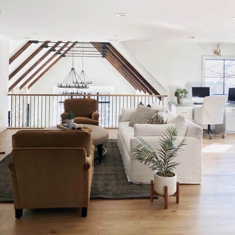 Two Story Vaulted Ceiling with Black Chandeliers