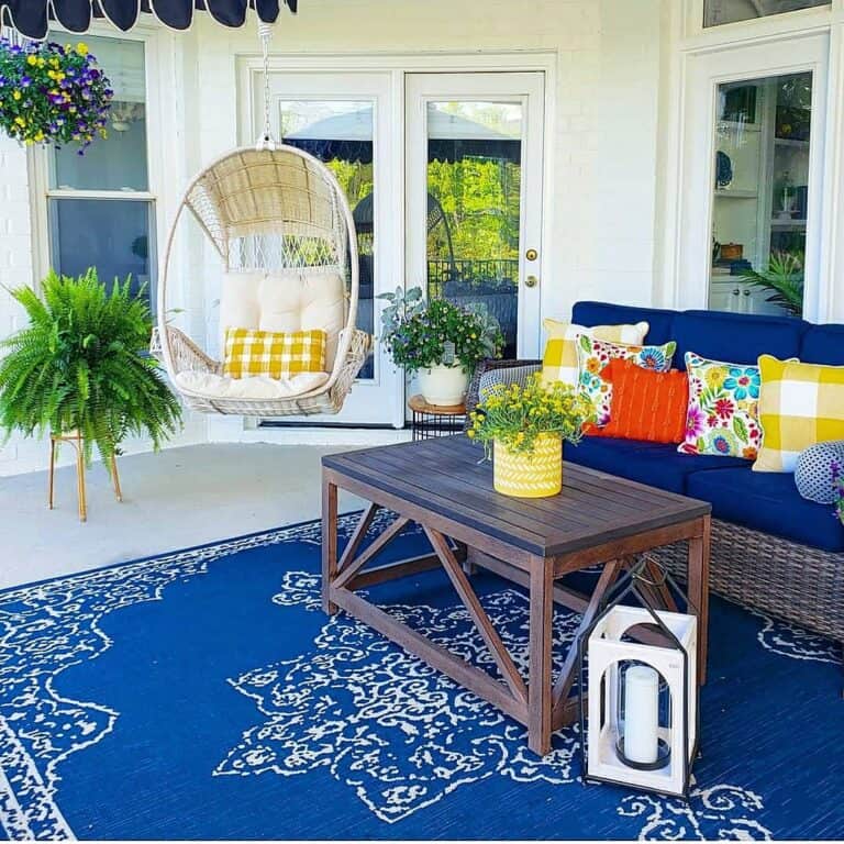 Blue and Beige Rug with Wicker Furniture