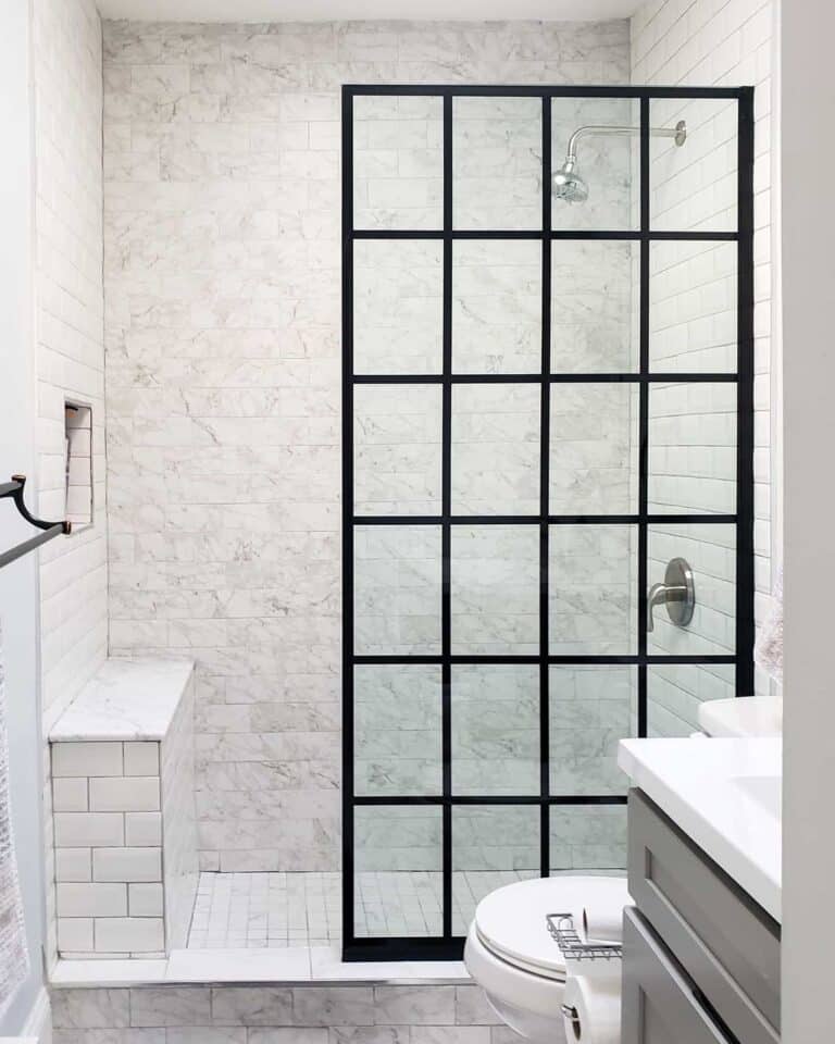 Black Framed Shower Enclosure in Neutral Gray and White Bathroom