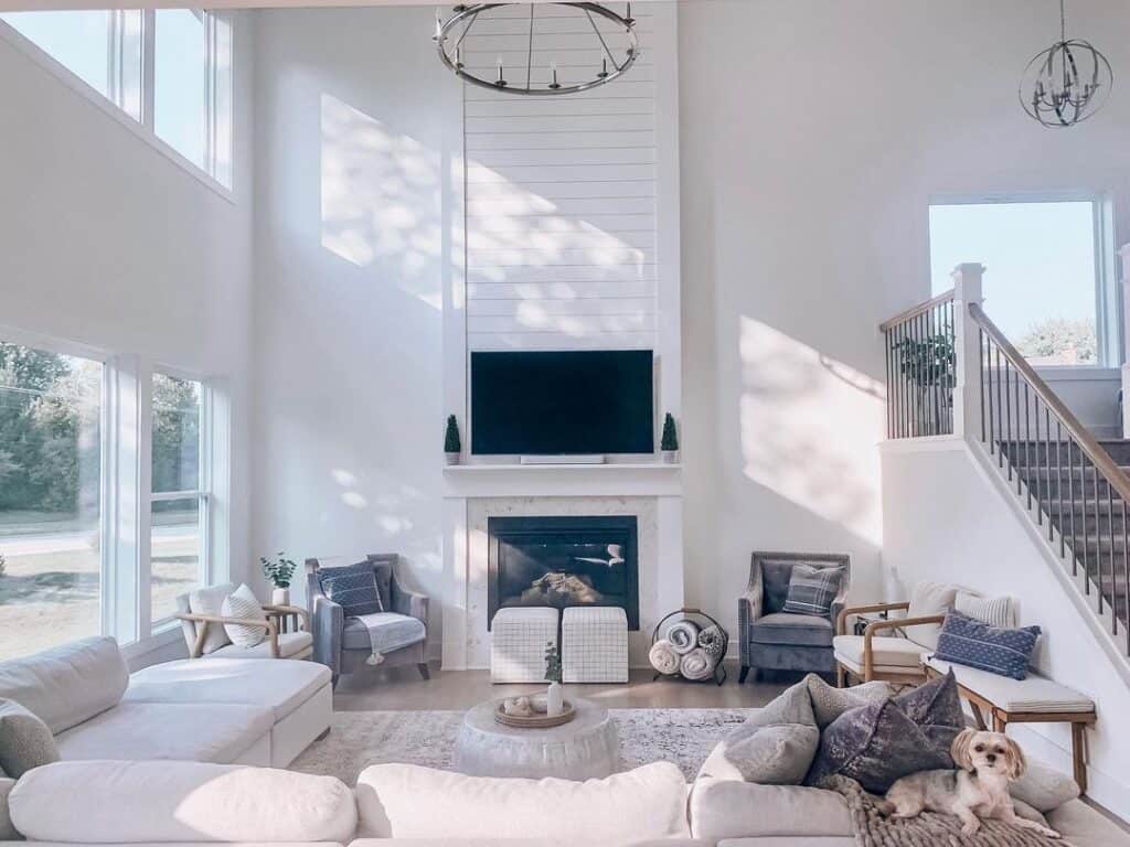 Wagon Wheel Chandelier in Two Story Living Room