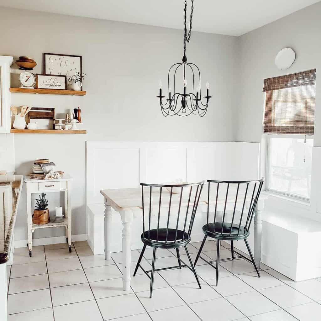 White Banquette with Black Spindle Dining Chair
