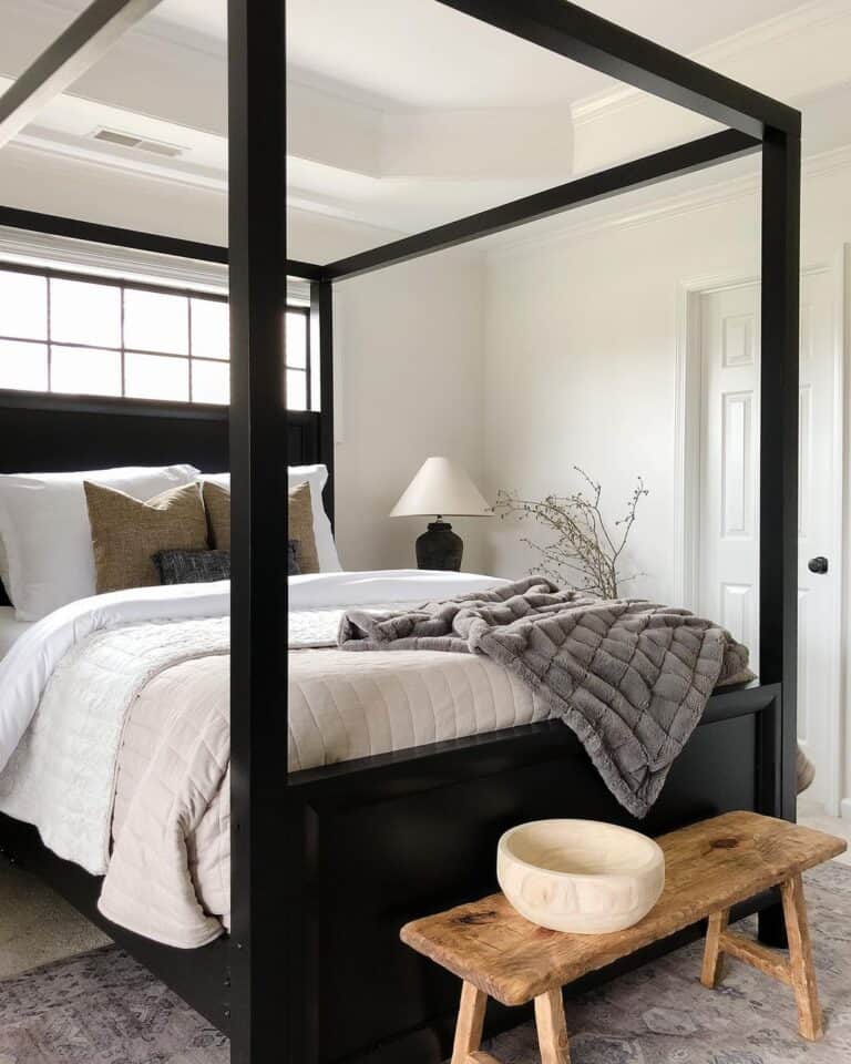 White Bedroom with Black Canopy Bed Frame