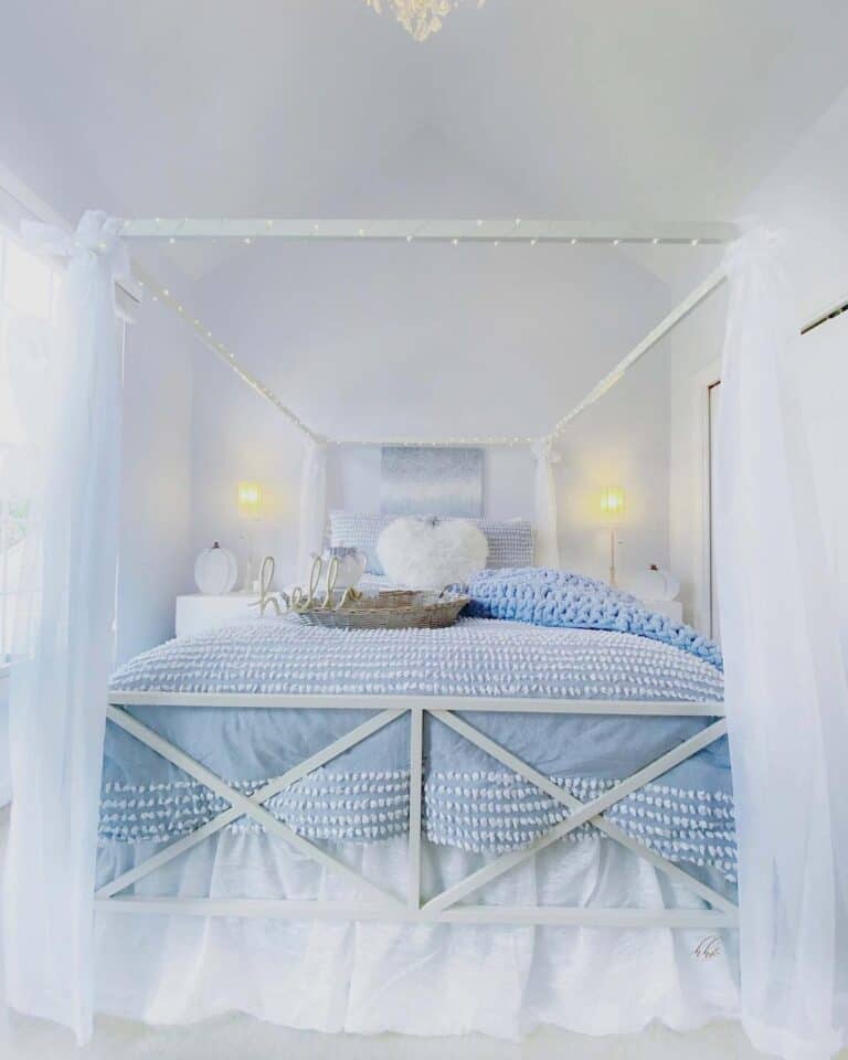 White Metal Canopy Bed with Sheer White Drapes