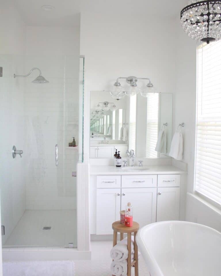White Staggered Tile Shower with Glass Door