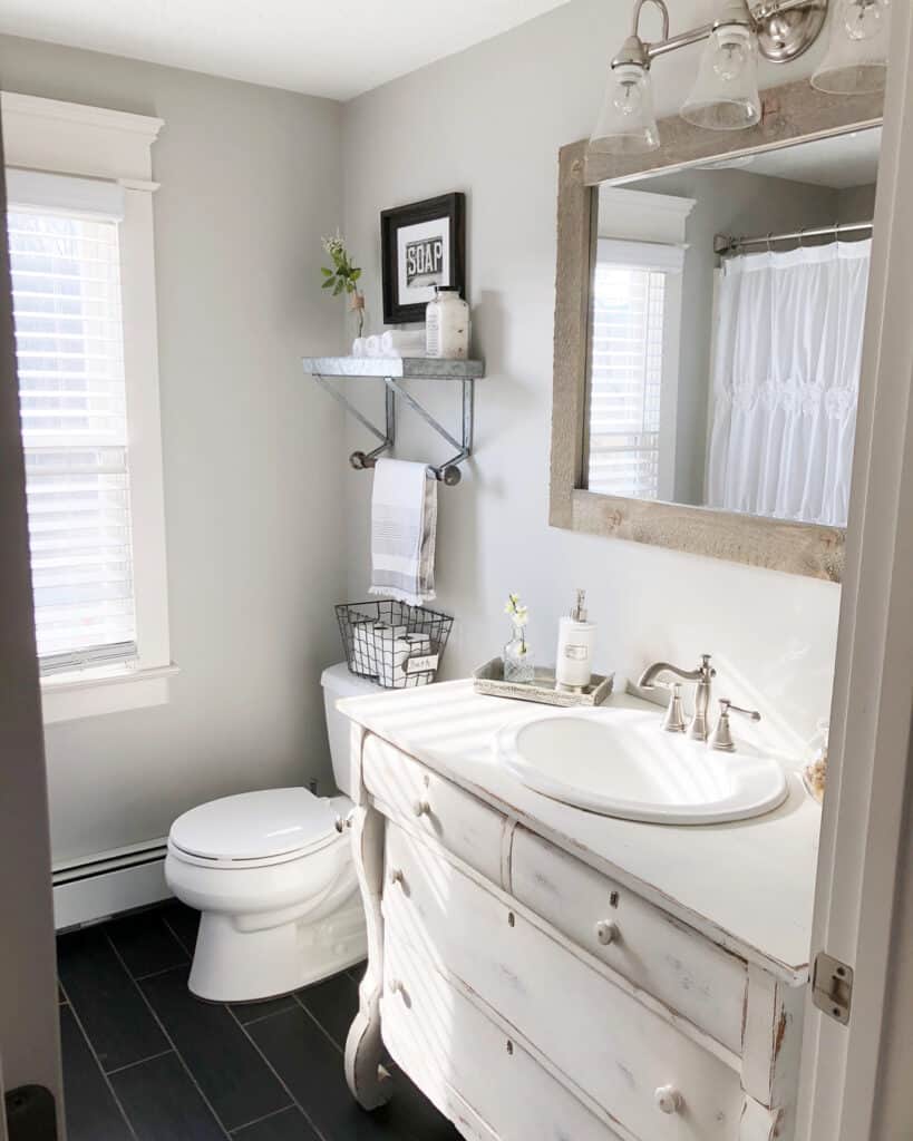 Bathroom with Rectangular Wood Framed Mirror