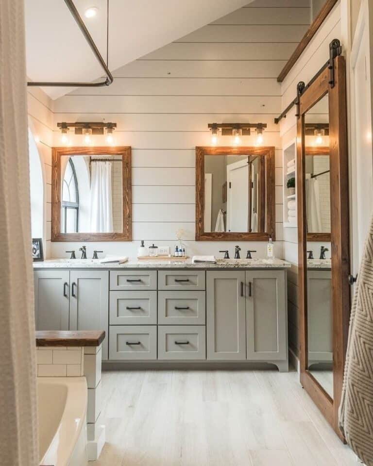 Bathroom with Stained Wood Framed Mirrors