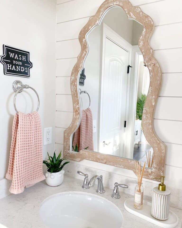 Bathroom with Wood Framed Vanity Mirror