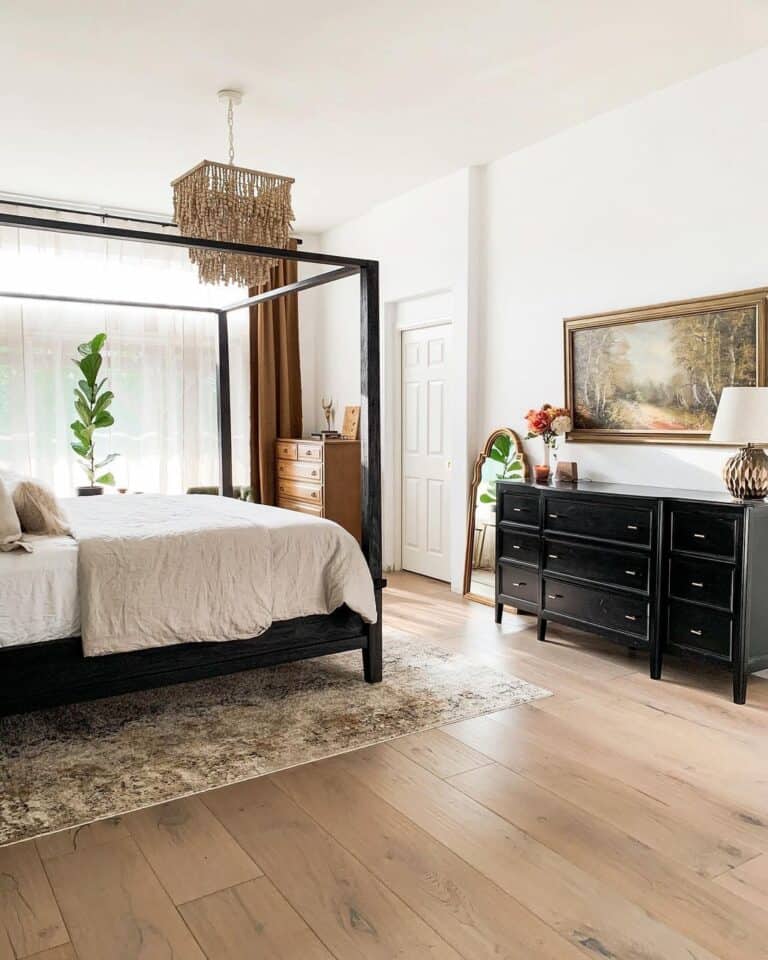 Bedroom with Black Wood Canopy Bed