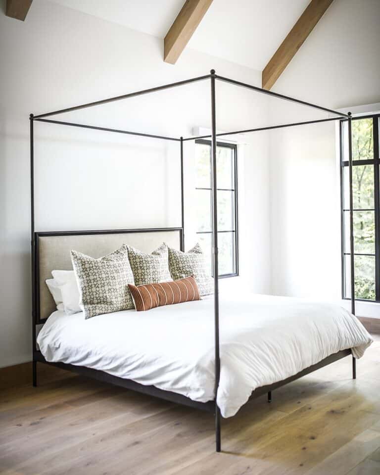 Canopy Bed with Beige Upholstered Headboard