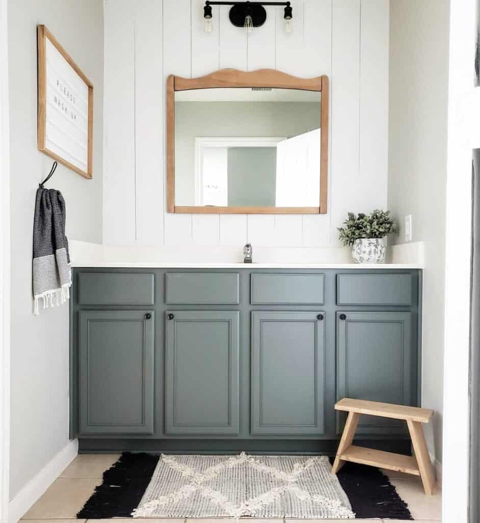 Gray Vanity with Wood Framed Bathroom Mirrors