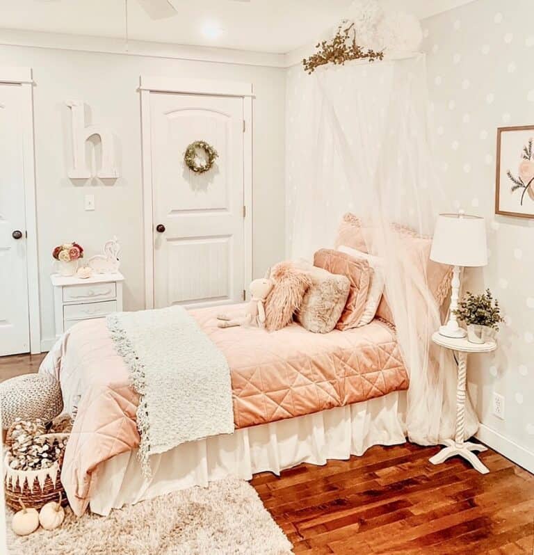 Pink and White Toddler Canopy Bed