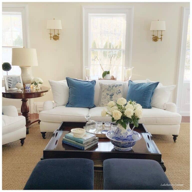 Small White Couch on Black Casters