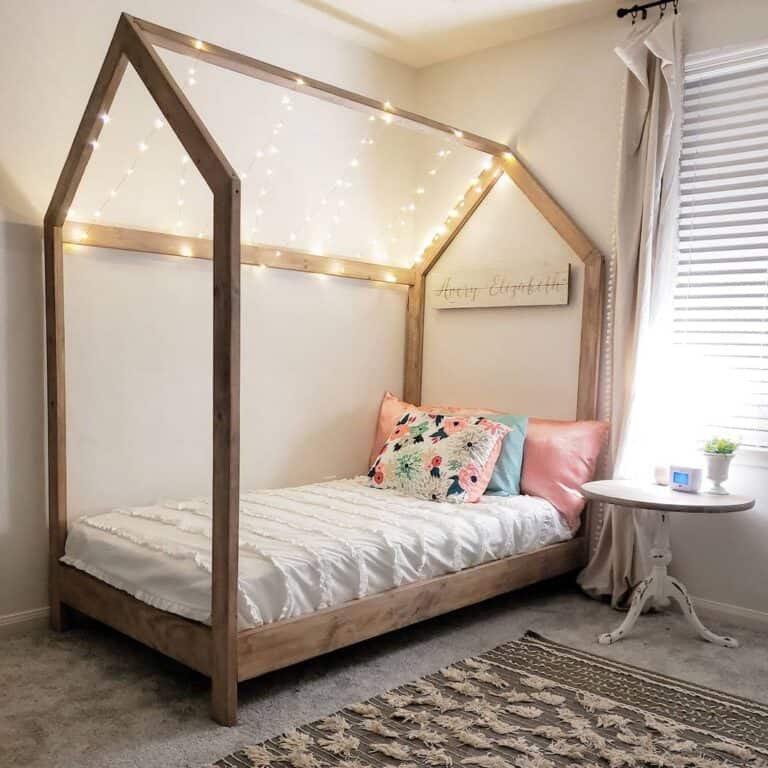 Stained Wood Kids House Bed with String Lights