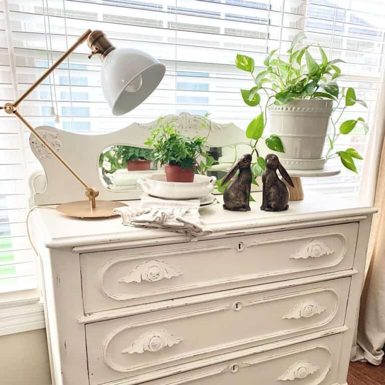 White and Gold Desk Lamp on White Dresser