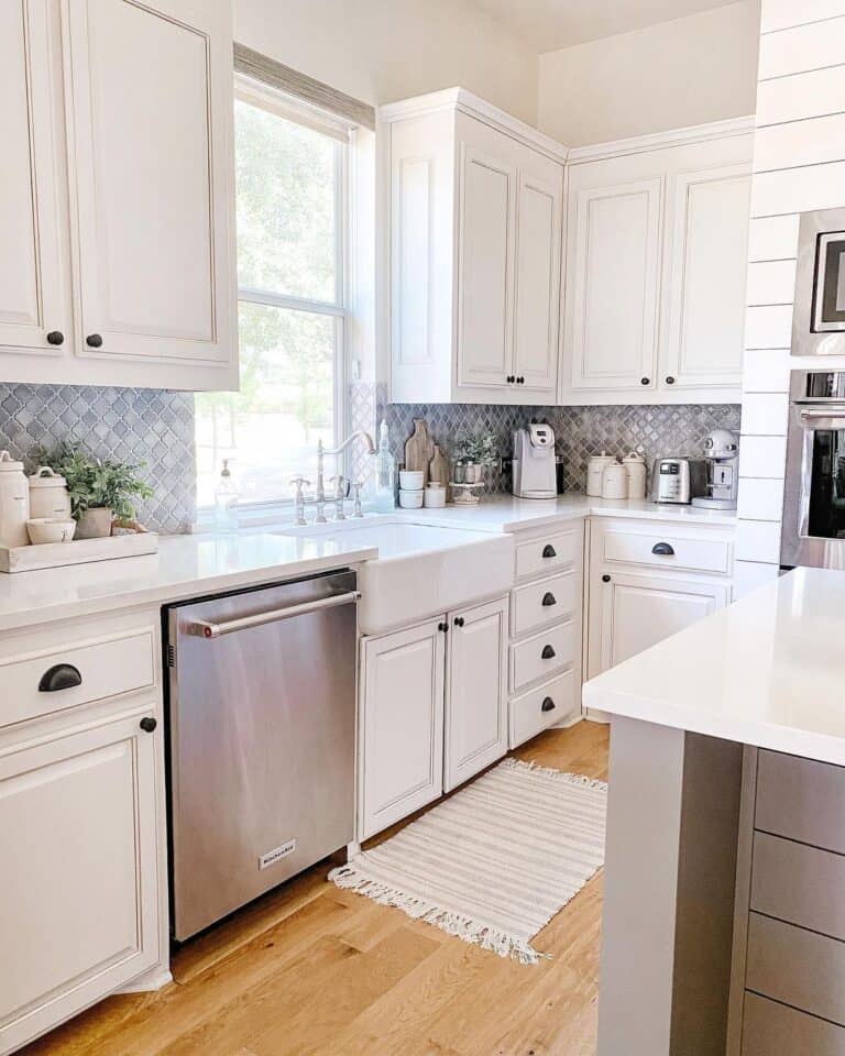 white kitchen cabinets gray backsplash