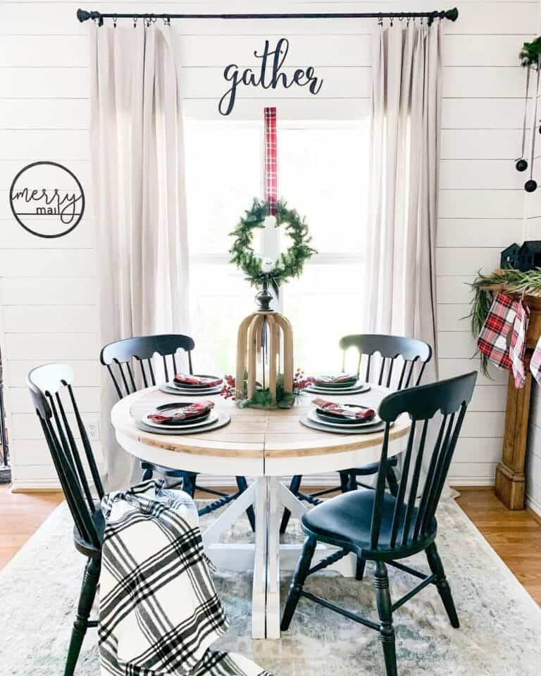 Round Farmhouse Dining Table with Black Chairs