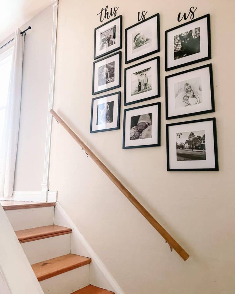 Black Framed Portraits On a Staircase Gallery Wall
