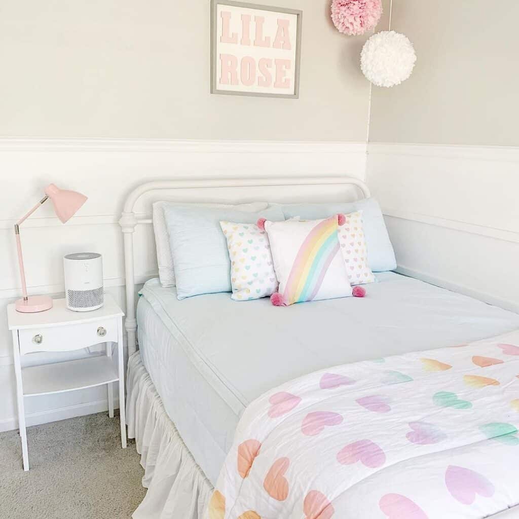 Girl's Bedroom with Rainbow Bedding