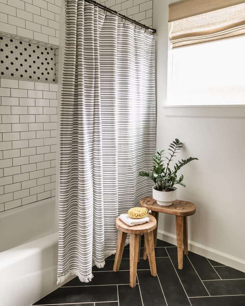 Herringbone Black Tile Bathroom With Subway Tile Shower