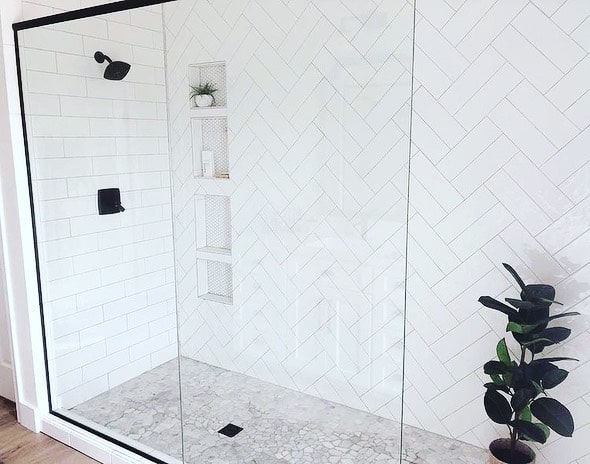 Herringbone Tile Shower with Pebble Pan