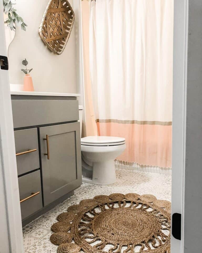 Stenciled Floor with Dark Grey Bathroom Cabinets