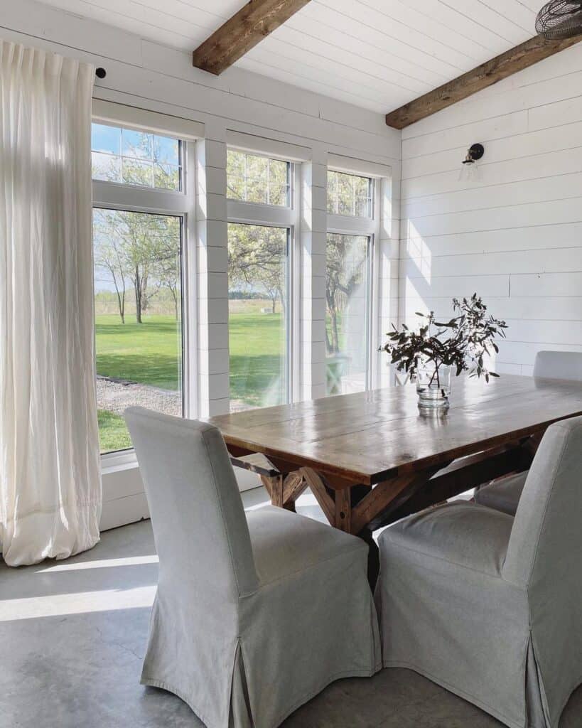 Vaulted White Shiplap Ceiling with Beams