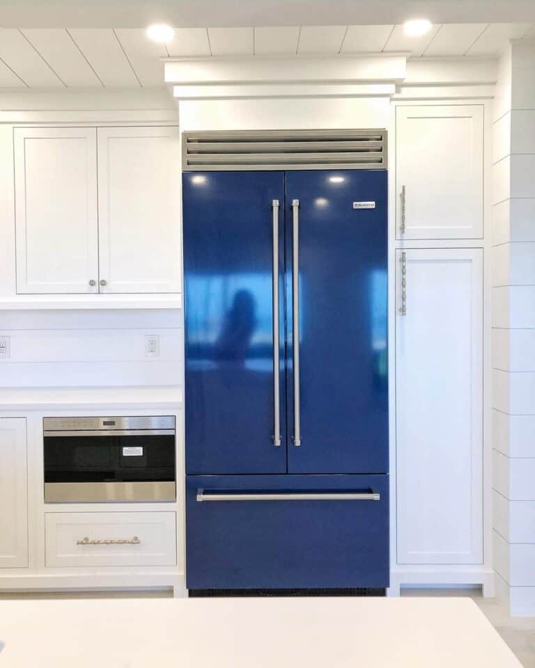 White Kitchen Cabinets with Navy Refrigerator