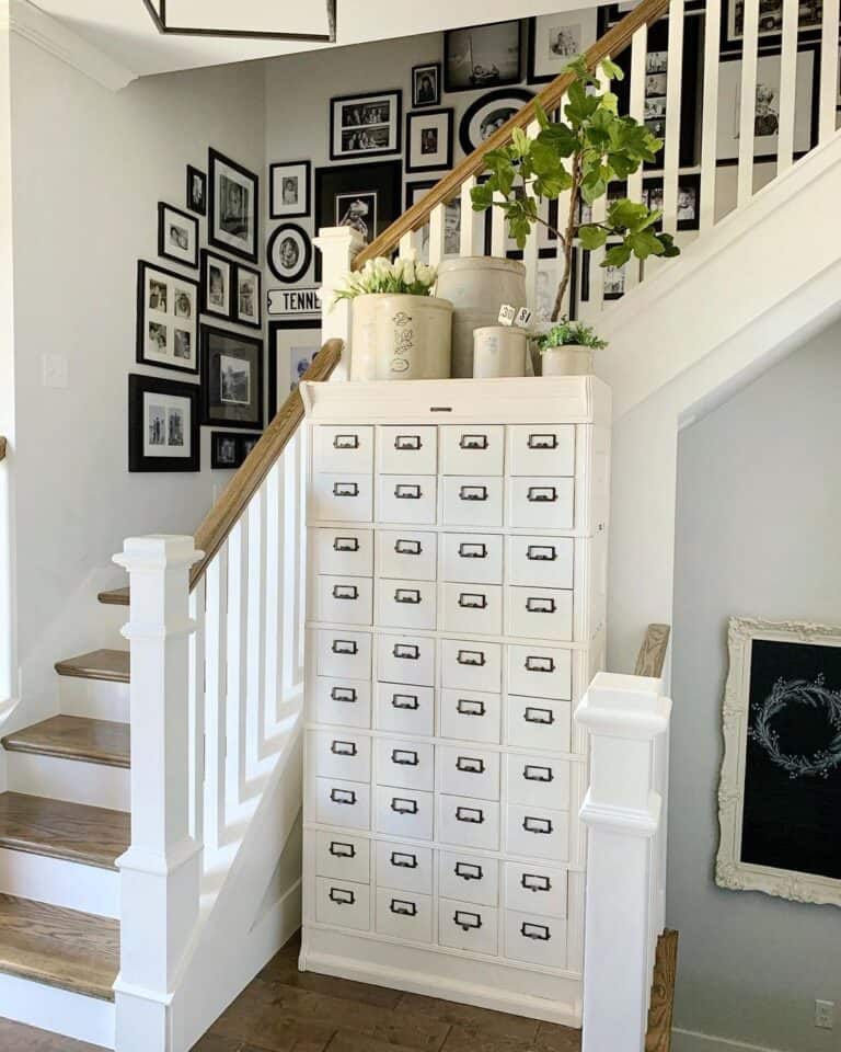 White Riser Staircase with Gallery Wall