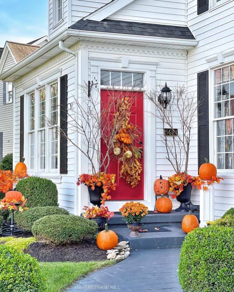 Autumn Themed Entrance With Red Front Door
