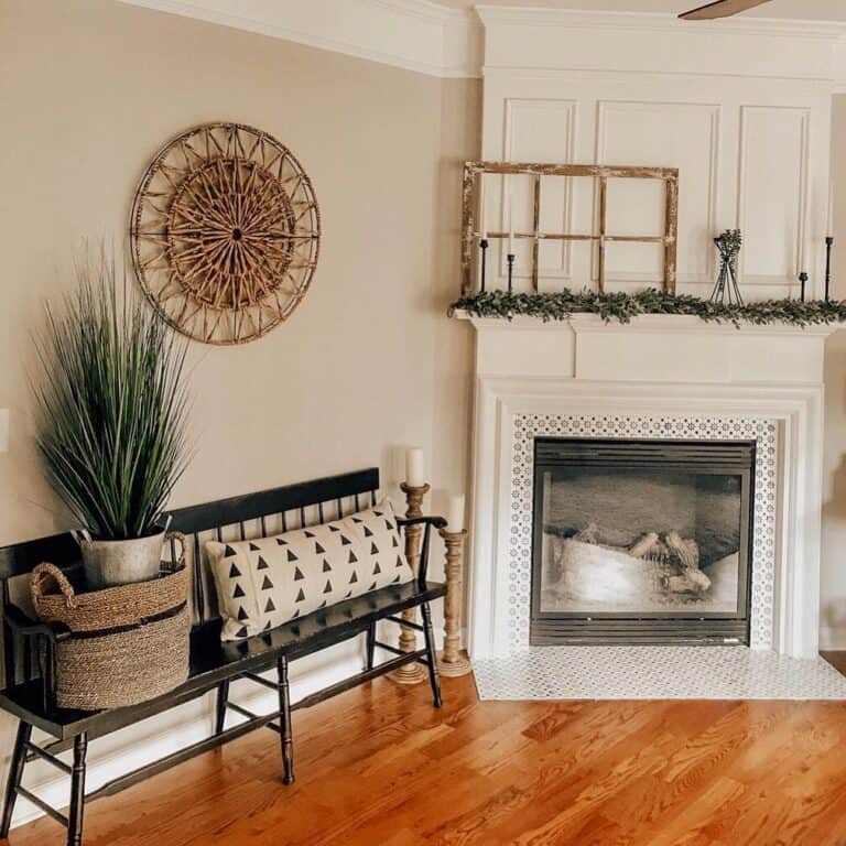Black Candlesticks on White Fireplace Mantel