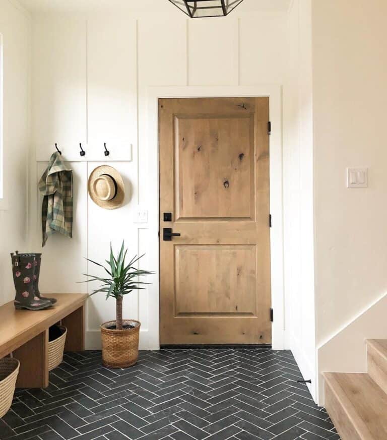 Black Herringbone Tile in an Entryway